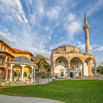 PRISTINA, KOSOVO - JULY 29, 2014: Fatih Mosque is the main city mosque and it is located in the center of the old town. Islam is the main religion in Kosovo.; Shutterstock ID 214757011
