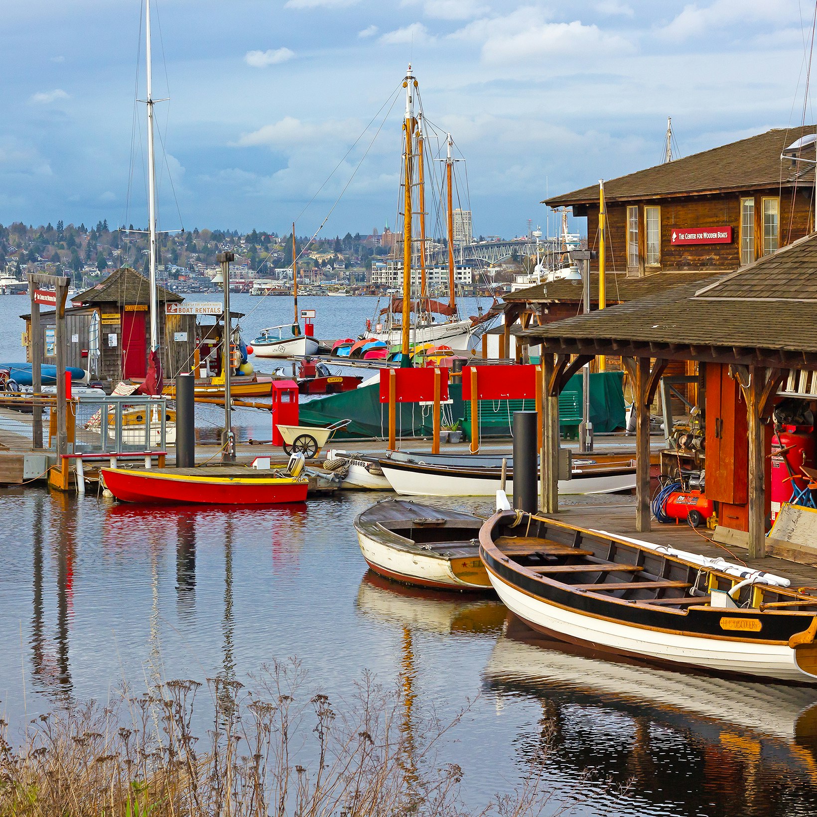 SEATTLE, USA - MARCH 22, 2016: Center for Wooden Boats on Lake Union on March 22, 2016 in Seattle, WA, USA. Various boats are available for rent to paddle on the Lake Union.; Shutterstock ID 430690528; Your name (First / Last): Alexander Howard; GL account no.: 65050; Netsuite department name: Online Editorial; Full Product or Project name including edition: Western USA neighborhood POI highlights