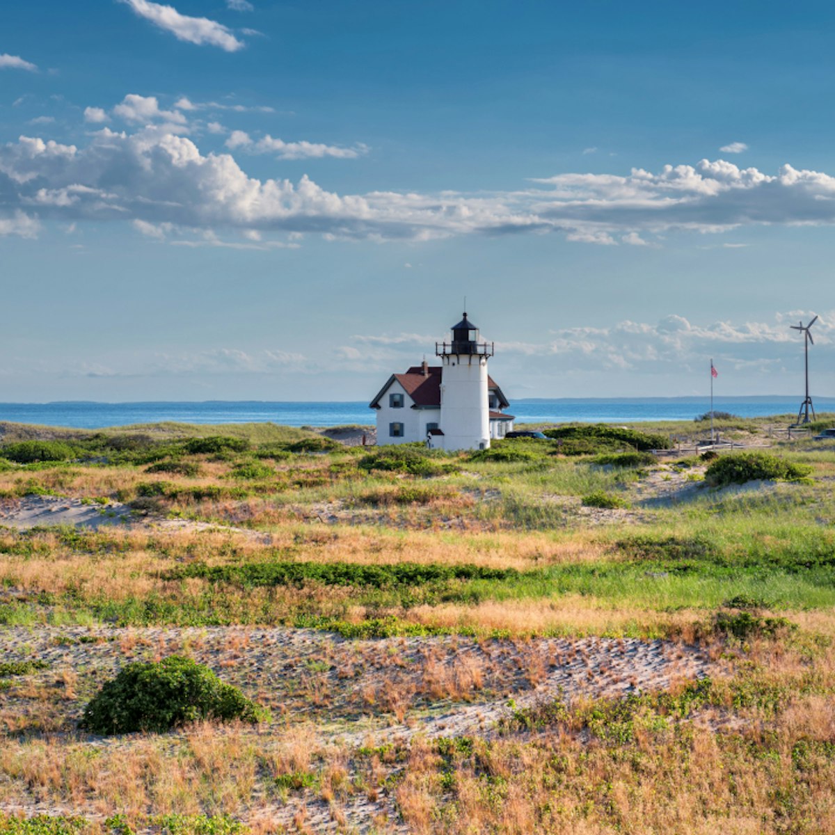 Race Point Light Lighthouse in sand dunes on the beach at Cape Cod, New England,  Massachusetts, USA.