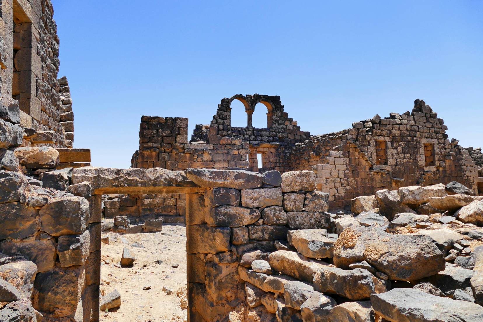 Scenic View Ancient Byzantine and Early Islamic Town Ruins of Umm el-Jimal in Northern Jordan; Shutterstock ID 555164446; Your name (First / Last): Lauren Keith; GL account no.: 65050; Netsuite department name: Content Asset; Full Product or Project name including edition: Jordan 2017