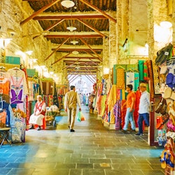 DOHA, QATAR - FEBRUARY 13, 2018: Visit traditional Eastern Souq Waqif with narrow alleyways, full of different goods and noisy vendors, on February 13 in Doha; Shutterstock ID 1166541733; Your name (First / Last): Lauren Keith; GL account no.: 65050; Netsuite department name: Online Editorial; Full Product or Project name including edition: Destination page image update