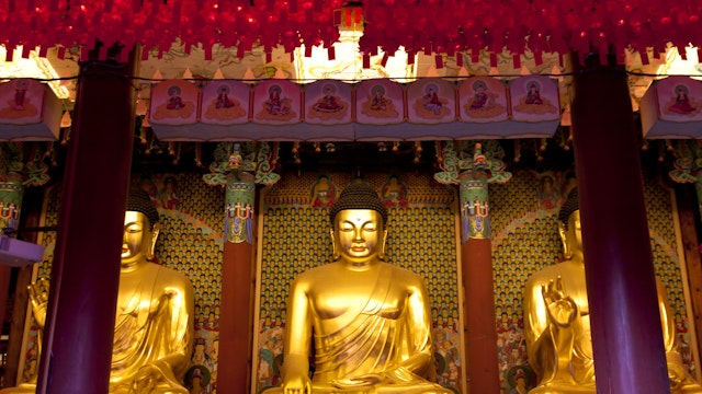 SEOUL KOREA MAY 12:Huge gilded Buddha statues at Jogye-sa Temple which is the chief temple of the Jogye Order of Korean Buddhism on may 12 2013 Seoul, South Korea.