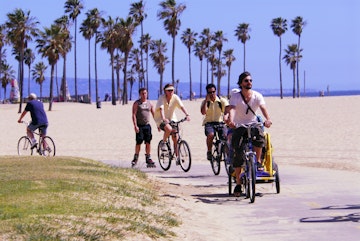 Cyclists and in-line skaters at Venice Beach.