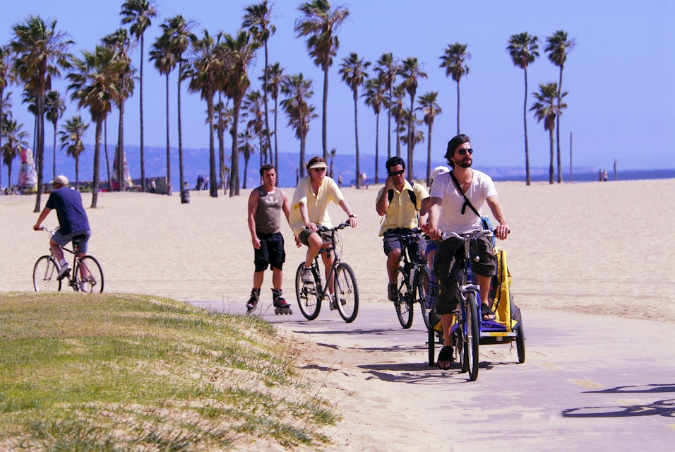 Cyclists and in-line skaters at Venice Beach.