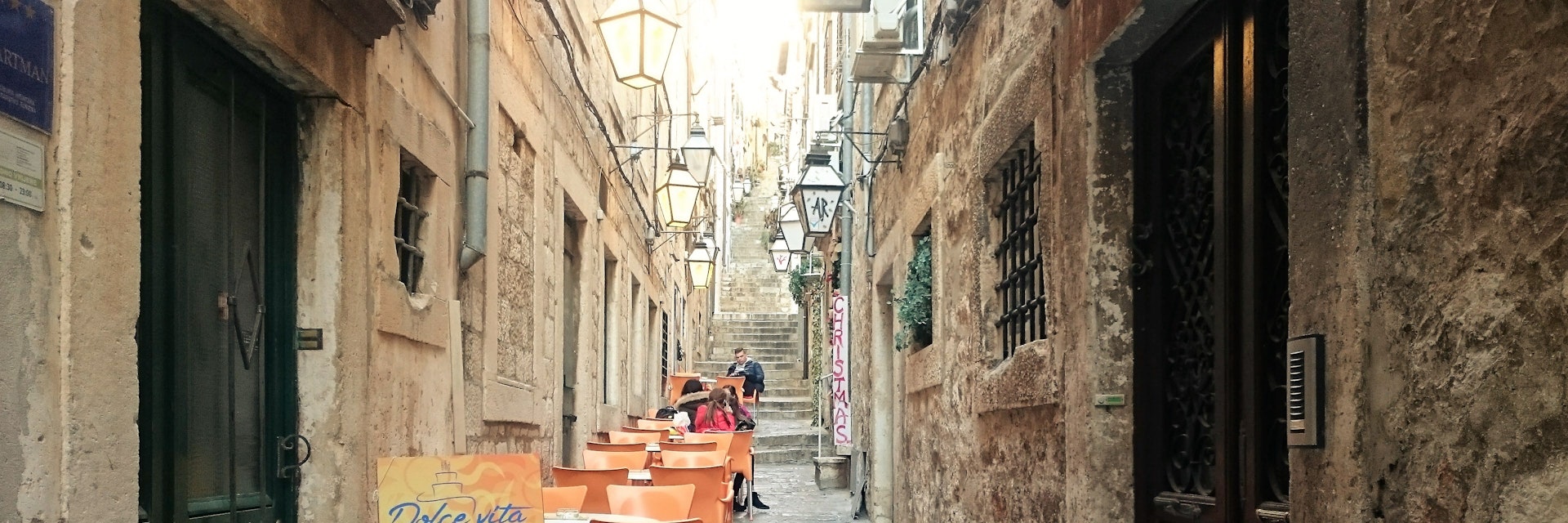 View of Dolce Vita outside seating from the beginning of the street