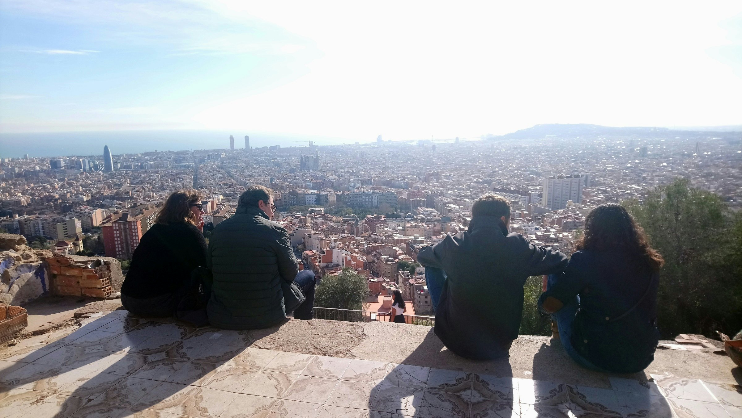 People admiring the view from Turó de la Rovira