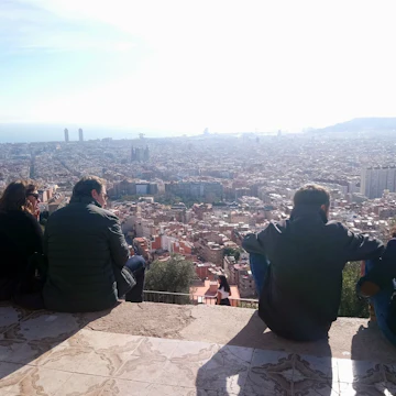 People admiring the view from Turó de la Rovira