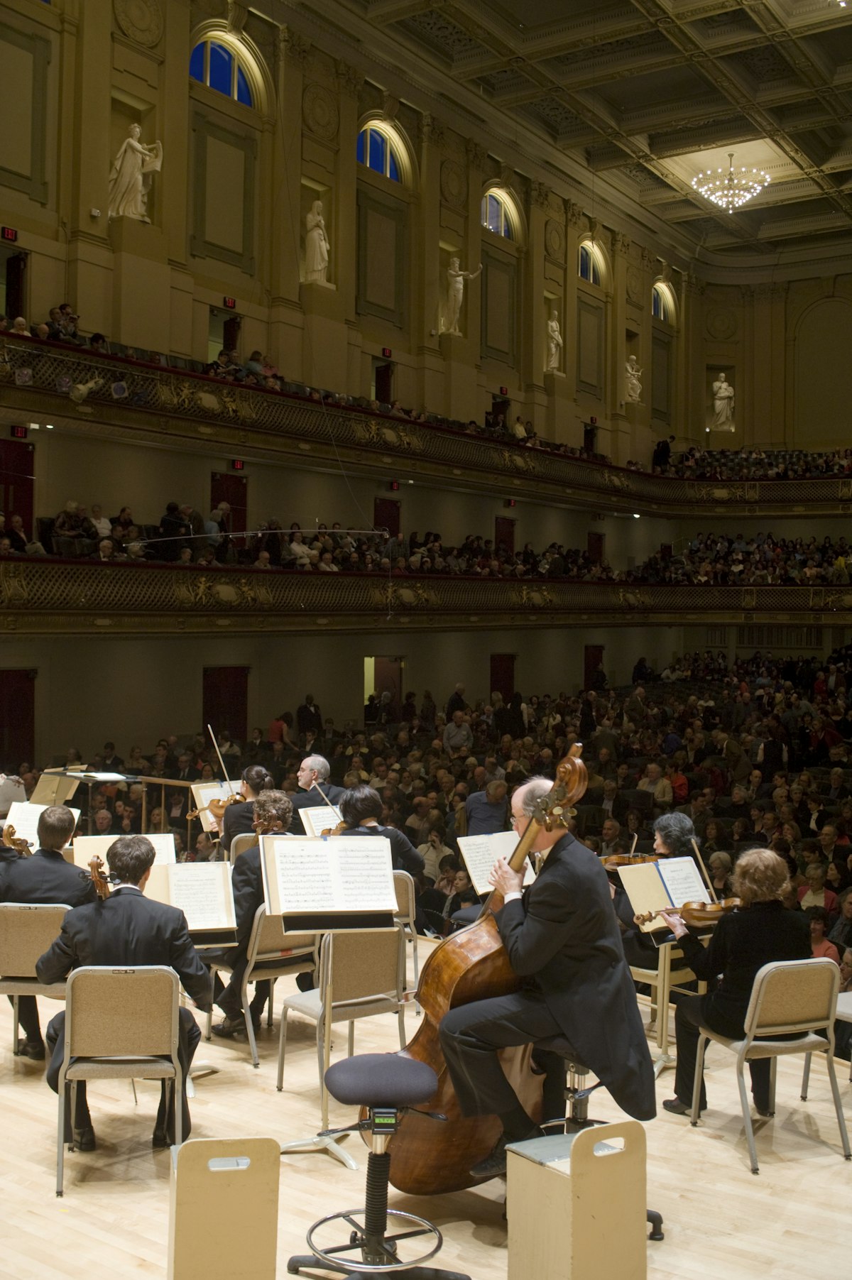 Boston Symphony Orchestra performing on stage.