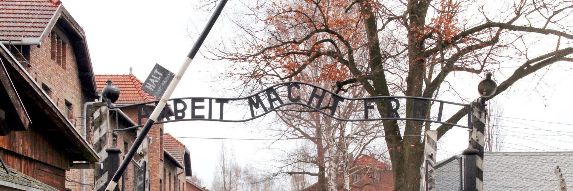 Gates to Auschwitz Birkenau Concentration Camp, Poland; Shutterstock ID 135123005; Your name (First / Last): Gemma Graham; GL account no.: 65050; Netsuite department name: Online Editorial; Full Product or Project name including edition: BiT Destination Page Images