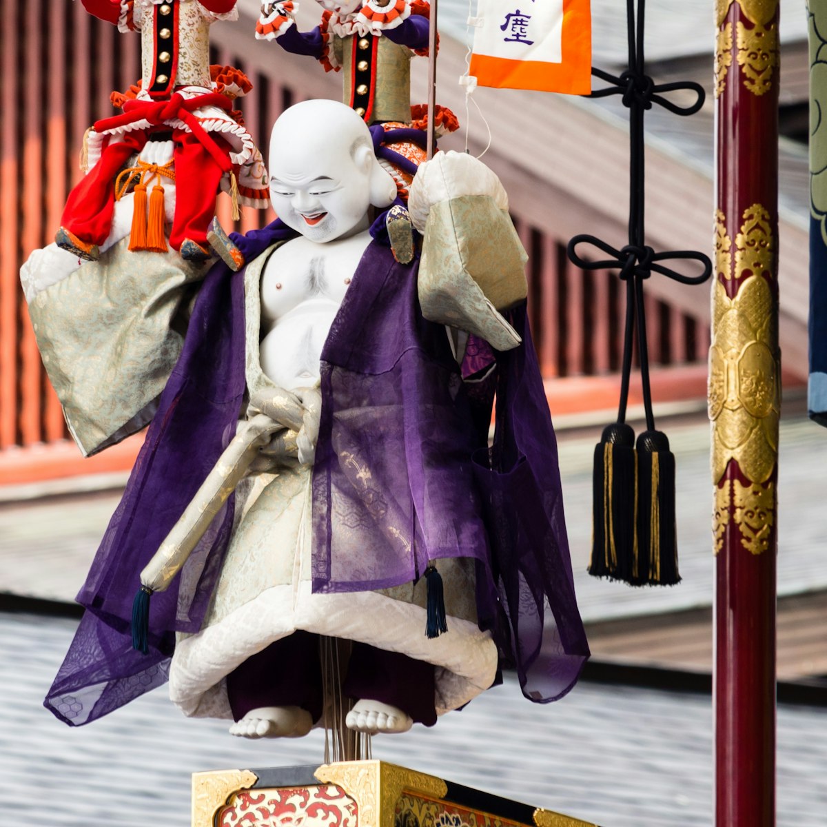 Takayama, Japan - October 9, 2015: Wooden puppets on top of Hotei decorated float during annual Takayama Autumn Festival; Shutterstock ID 602701325; Your name (First / Last): Laura Crawford; GL account no.: 65050; Netsuite department name: Online Editorial; Full Product or Project name including edition: BiA images Yokohama, Takayama, Kamakura