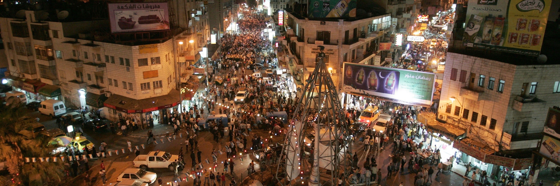 West Bank city of Ramallah, Palestinians in the streets at evening on the last day of the holy month of Ramadan
