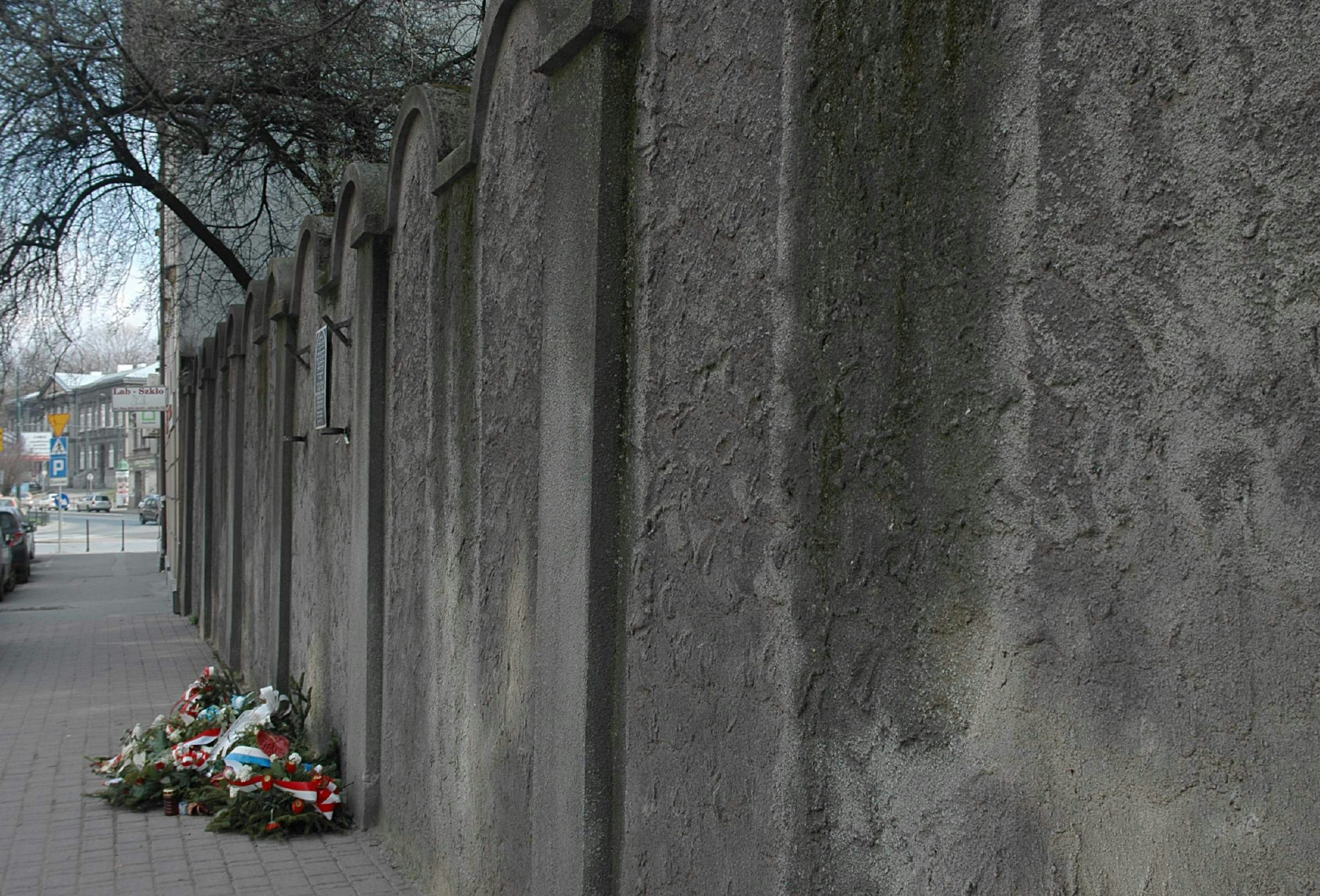 Floral tributes laid down beside the WWII Jewish Ghetto Wall