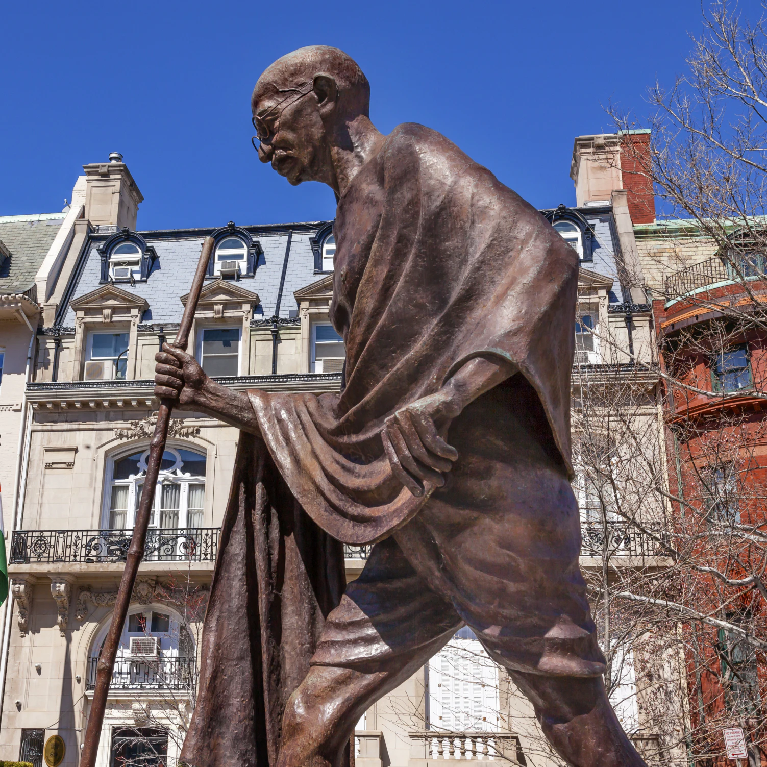 Mahatma Mohandas Gandhi Public Statue Front of Indian Embassy Embassy Row Massachusetts Ave Washington DC. Gandhi is walking to sea on salt march. Dedicated September 2000, Artist Gautam Pal; Shutterstock ID 302137574; Your name (First / Last): Lauren Gillmore; GL account no.: 56530; Netsuite department name: Online-Design; Full Product or Project name including edition: 65050/ Online Design /LaurenGillmore/POI