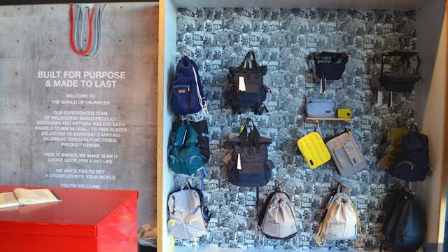 Crumpler bags hanging on the walls of their Smith Street Collingwood store.