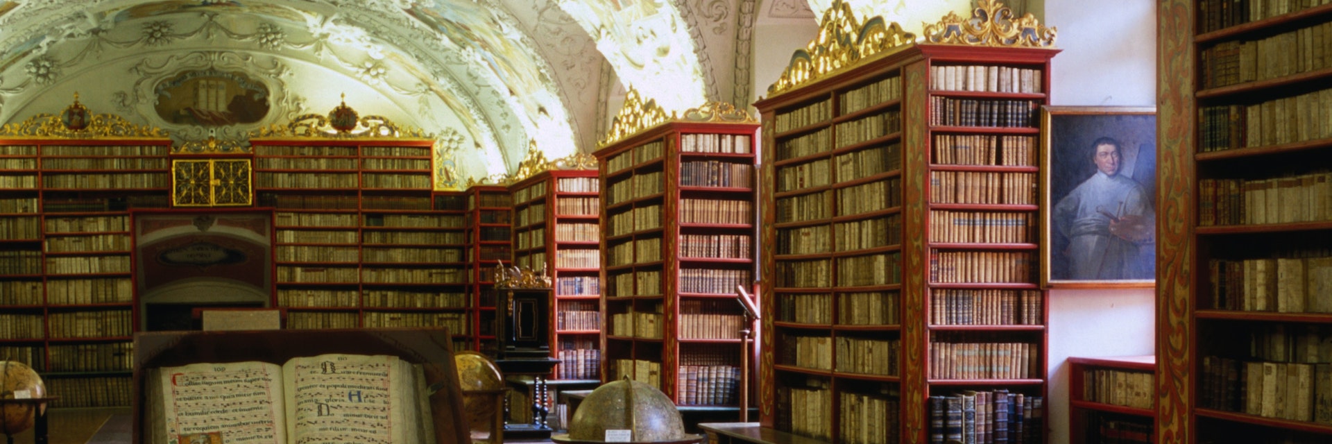 Globes and bookshelves in Theology Hall, Strahov Monastery.