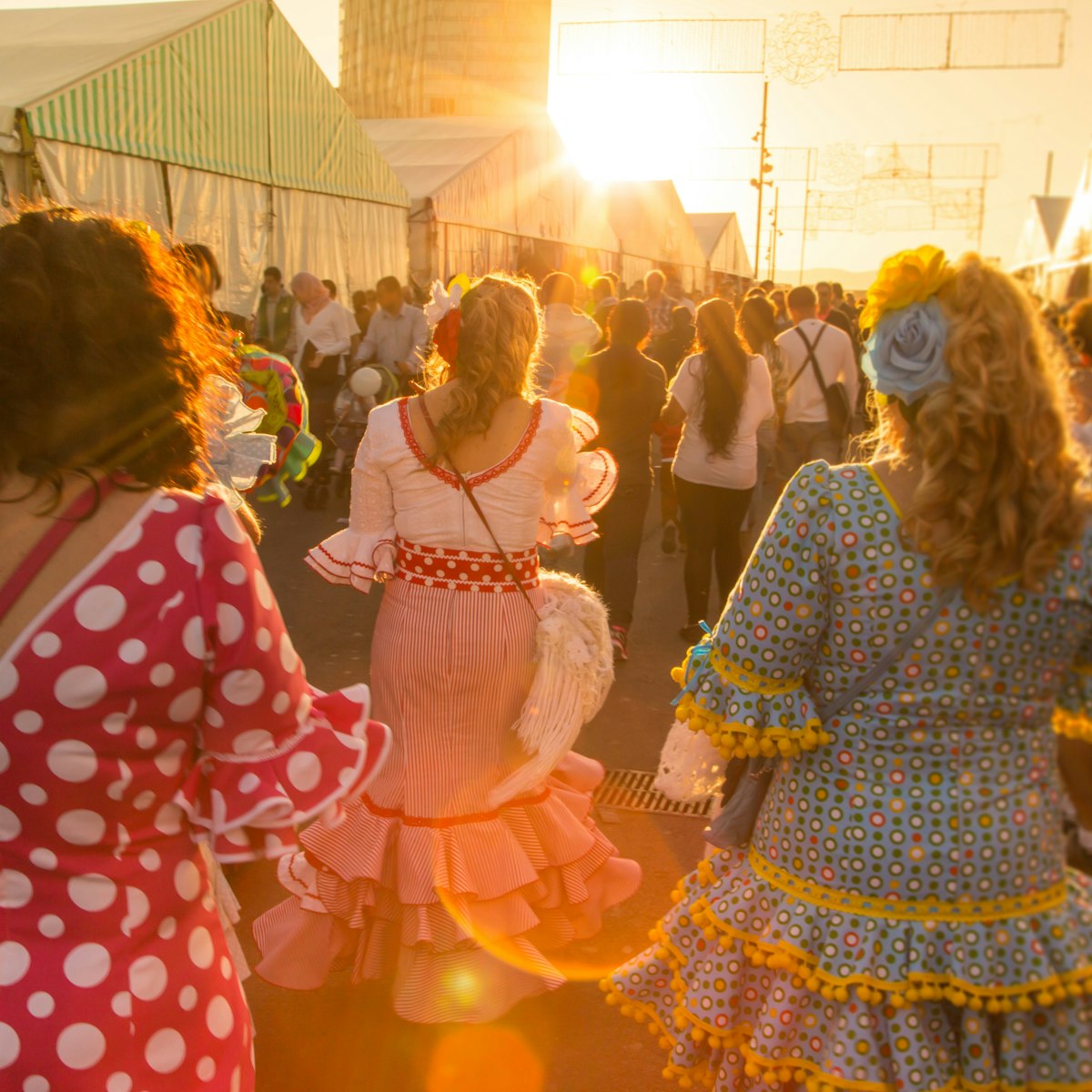 Women with flamenco dress in Feria de Abril.
