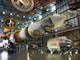 Saturn V rocket displayed above Apollo command and service modules at the Apollo/Saturn V Center at the Kennedy Space Center.