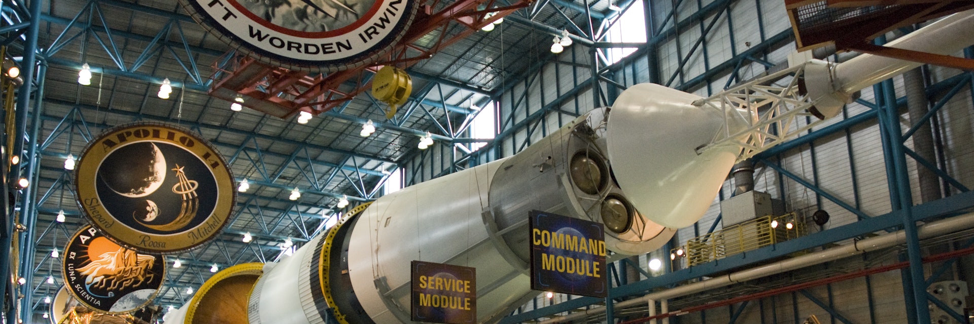 Saturn V rocket displayed above Apollo command and service modules at the Apollo/Saturn V Center at the Kennedy Space Center.