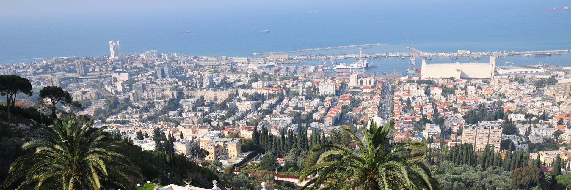 Israel, Haifa, The gardens of the Bahai Shrine downtown Haifa in the background