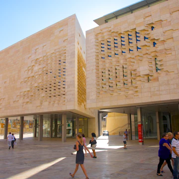 Modern stone and glass Parliament building near Valletta City Gate at entrance to Valletta, Malta. Designed by architect Renzo Piano of Renzo Piano Building Workshop and completed in 2014.