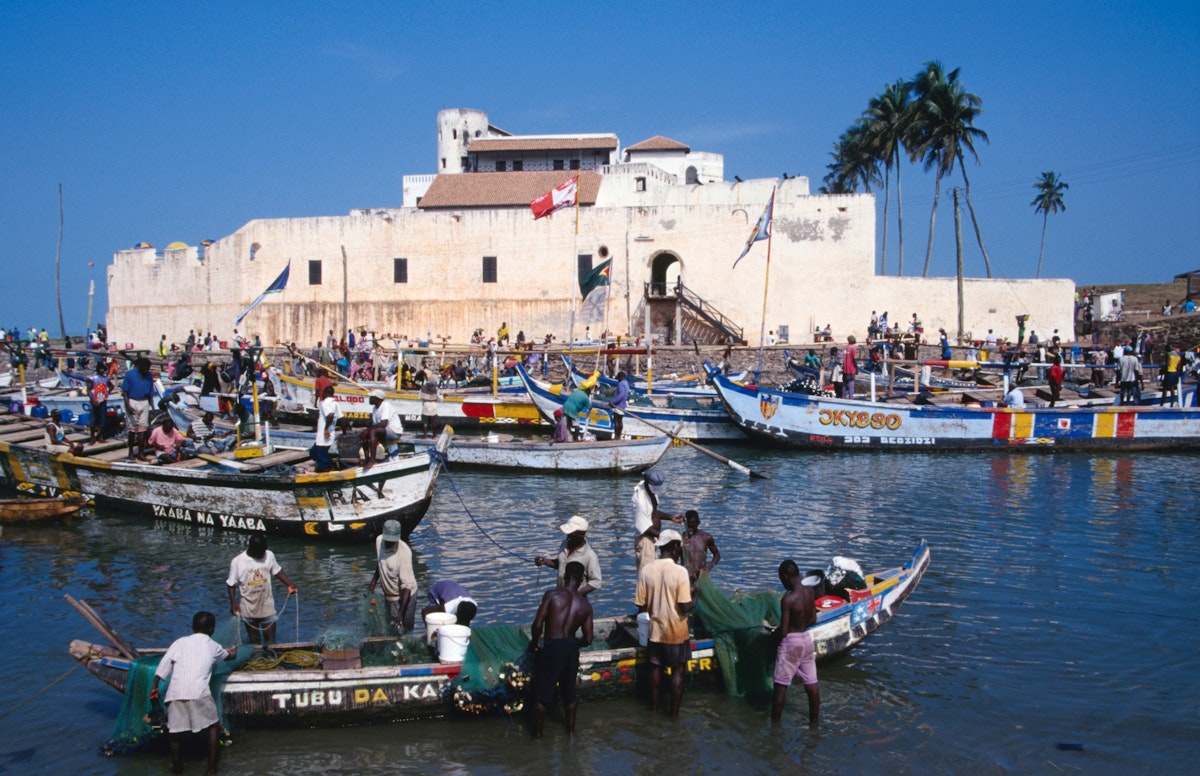 Fishermen and their colourful boats in front of St George's Castle.