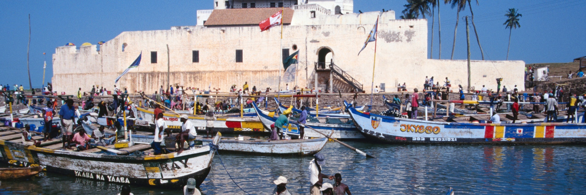 Fishermen and their colourful boats in front of St George's Castle.