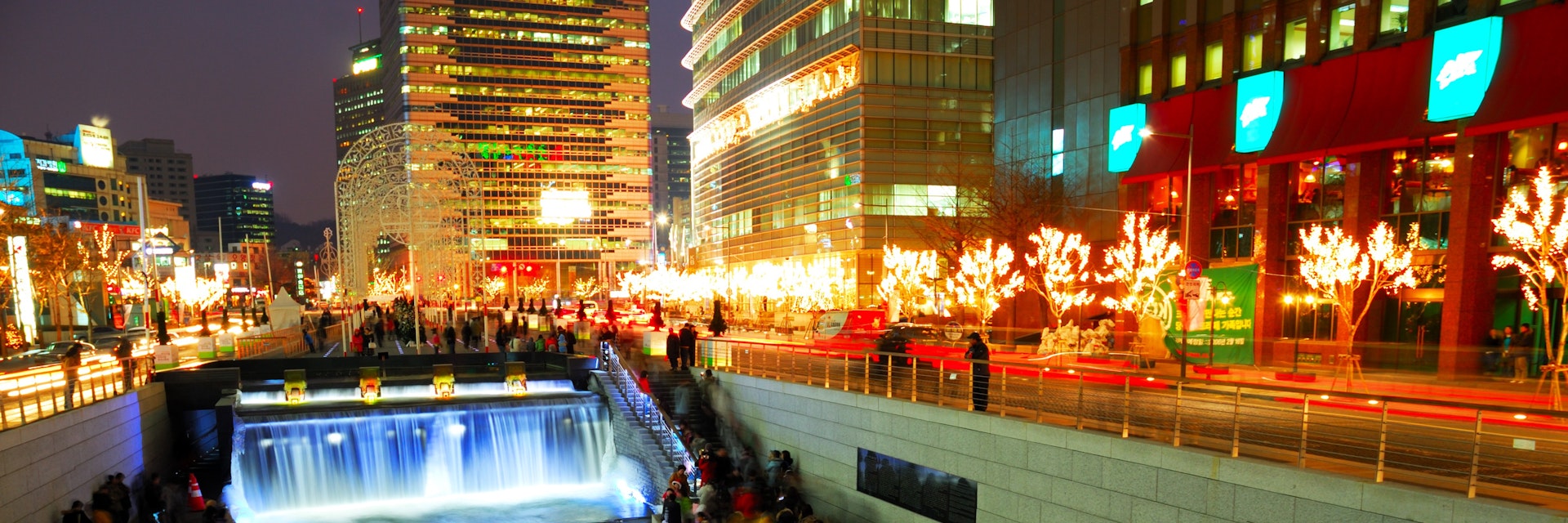 The Cheonggyecheon Stream draws crowds of locals out in early evening.