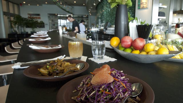The jicama and grapefruit salad with sauteed eggplant on side at bar at Slanted Door in Ferry Building on Embarcadero.