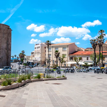 pedestrian area on the ramparts near the Sulis Tower in Alghero - Sardinia in a sunny day of spring; Shutterstock ID 1098623615; Your name (First / Last): Anna Tyler; GL account no.: 65050; Netsuite department name: Online Editorial; Full Product or Project name including edition: destination-image-southern-europe