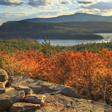 "Afternoon sun on sunset rock in the Autumn, overlooking North-South Lake in the Catskills Mountains of New York. (HDR)."