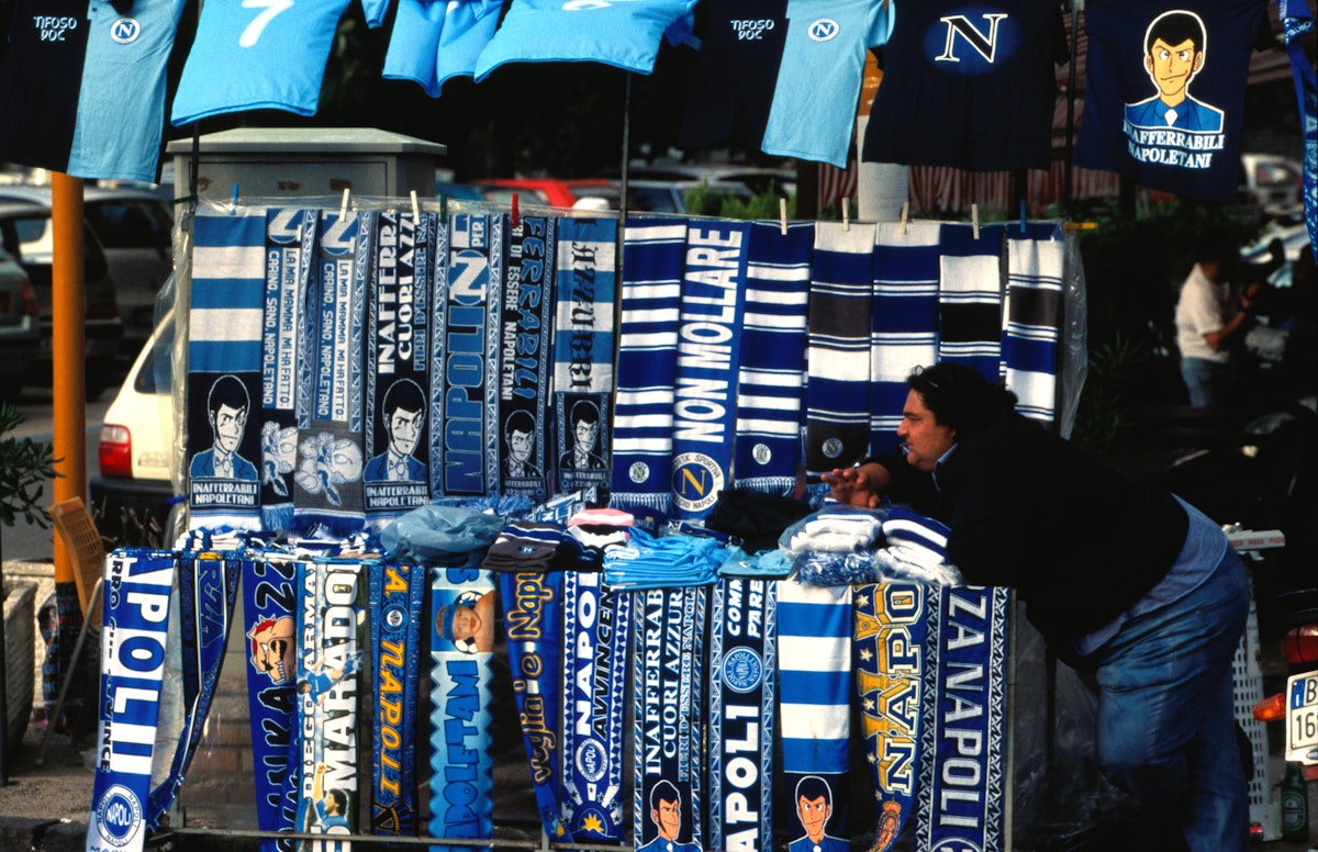 Merchandise stall at football match at Stadio San Paolo.