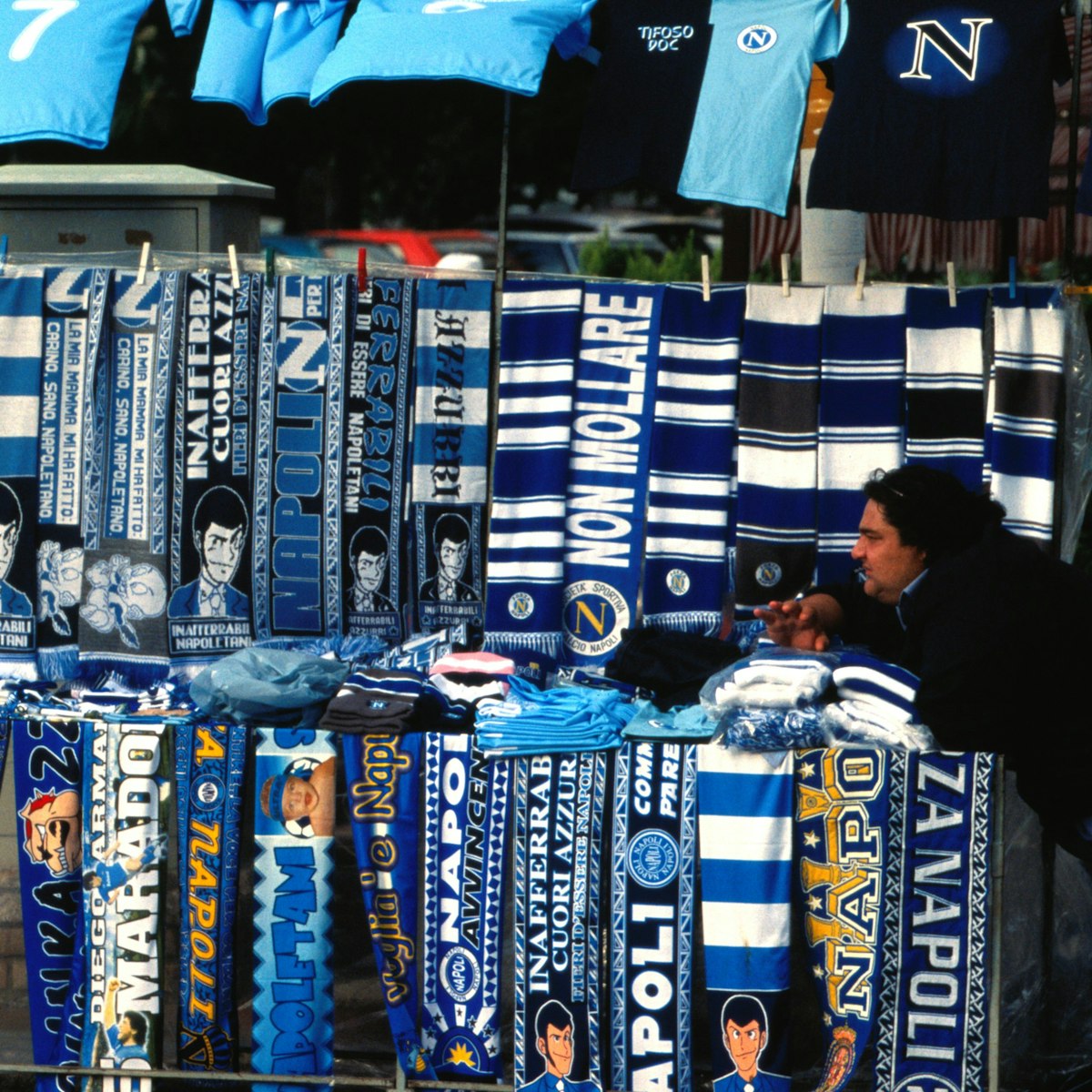 Merchandise stall at football match at Stadio San Paolo.