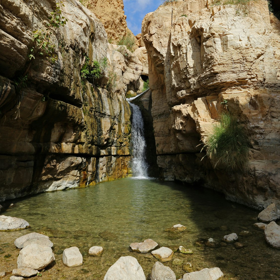 Wadi Arugot in Ein Gedi Nature reserve, Israel. One of the largest streams in the Judean desert. Picturesque Hidden waterfall is popular destination for hikers in the valley.; Shutterstock ID 637434220; Your name (First / Last): Lauren Keith; GL account no.: 65050; Netsuite department name: Online Editorial; Full Product or Project name including edition: Dead Sea Online Update