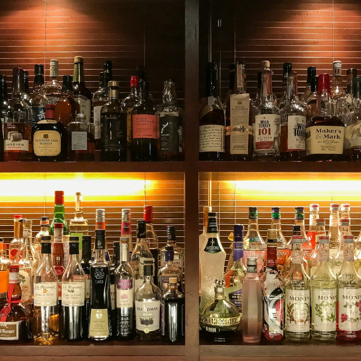Spirits behind the cocktail bar at Butler
