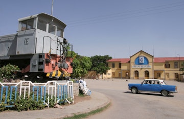 Railway station, train and taxi.