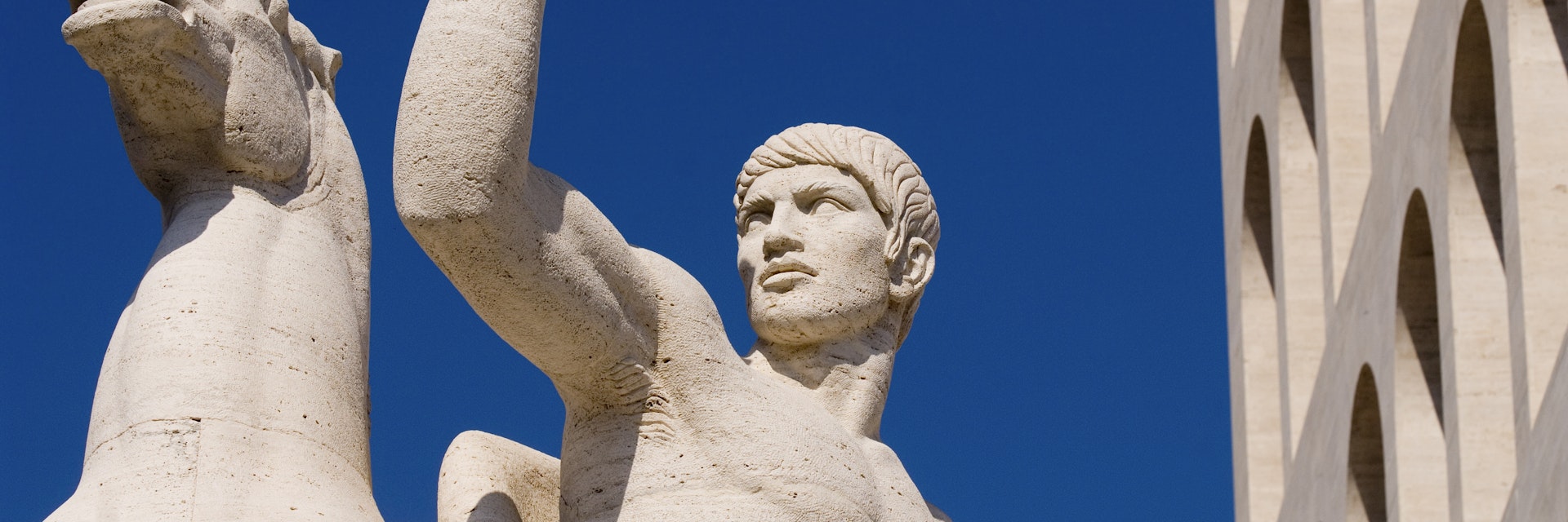 Statue outside Palazzo della Civilita del Lavoro, EUR area.
