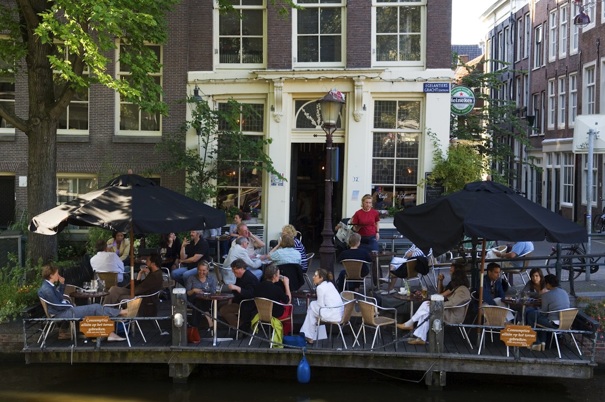 Exterior of Cafe't Small during late afternoon in Jordaan area.
