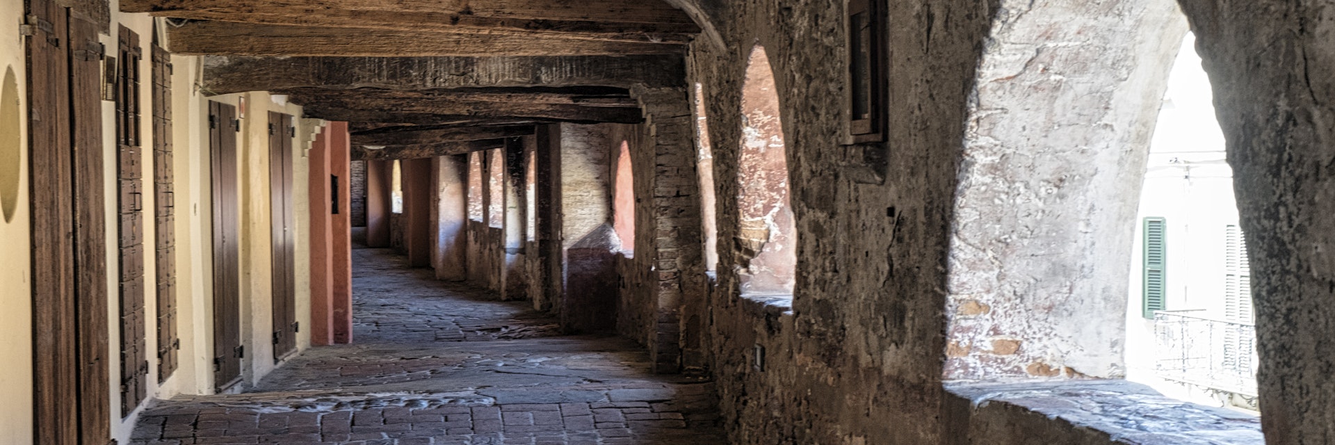 Brisighella (Ravenna, Emilia Romagna, Italy): the famous covered street known as via degli Asini or via del Borgo