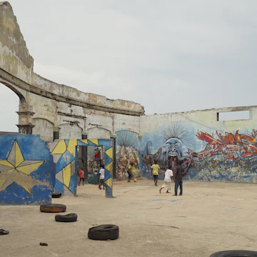 Kids play football in an abandoned house, Jamestown