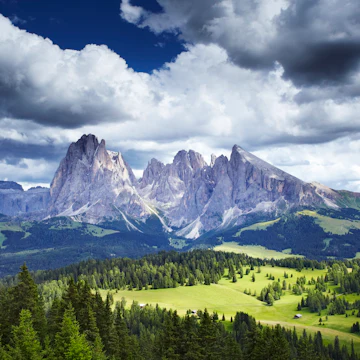Overview of Sassolungo mountain range, seen from Alpe di Siusi cable car station.