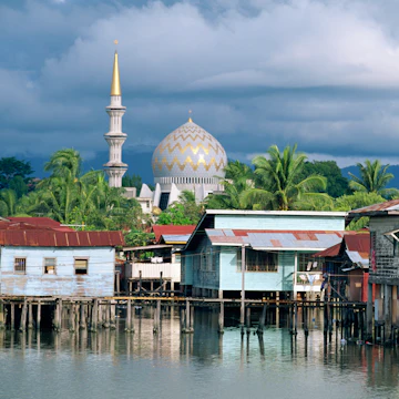Stilt village and State Mosque in Kota Kinabalu, Asia's fastest growing city and capital of Sabah, northern tip of Borneo, Malaysia, Southeast Asia, Asia