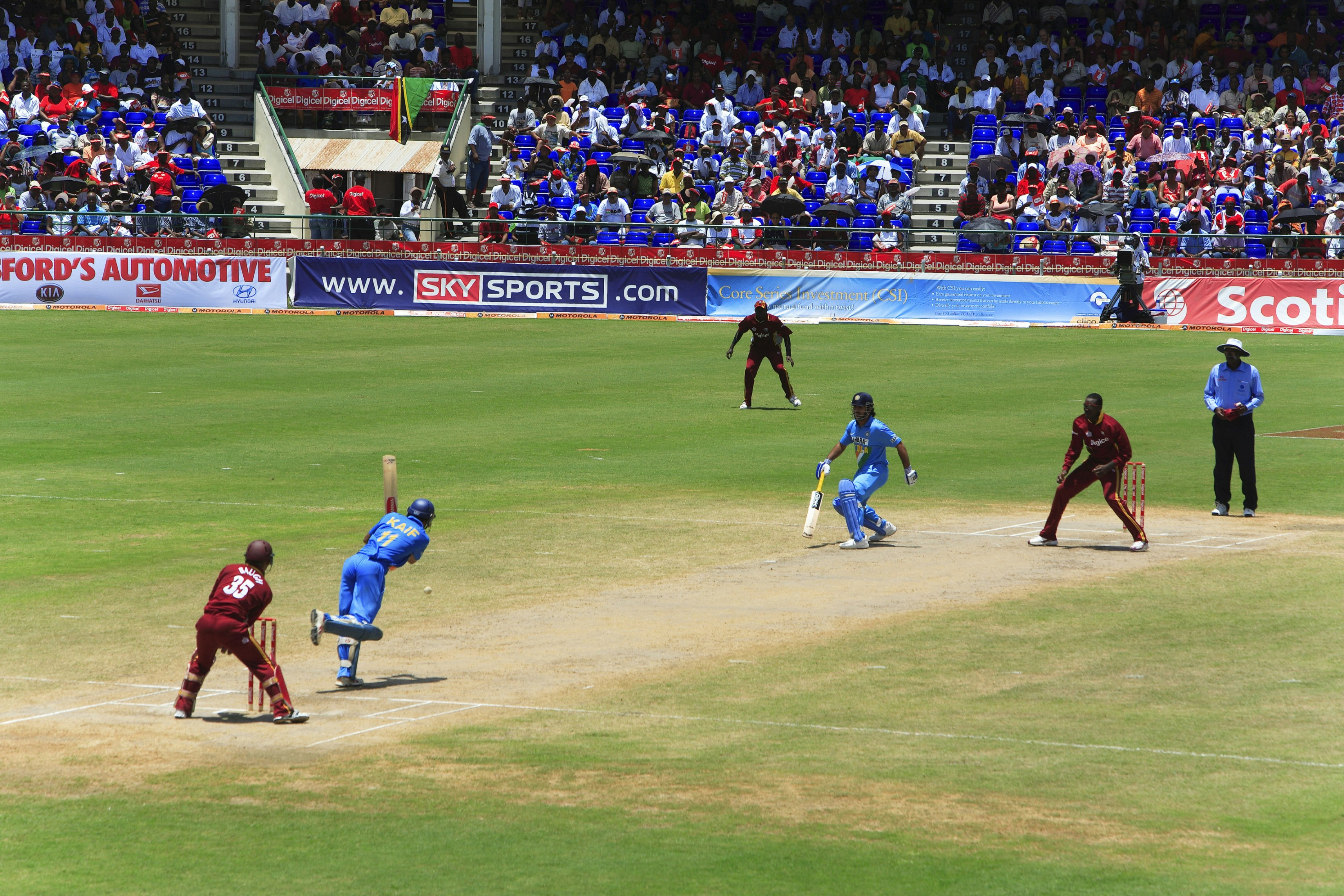 West Indies vs India cricket match at Warner Park Cricket Stadium.