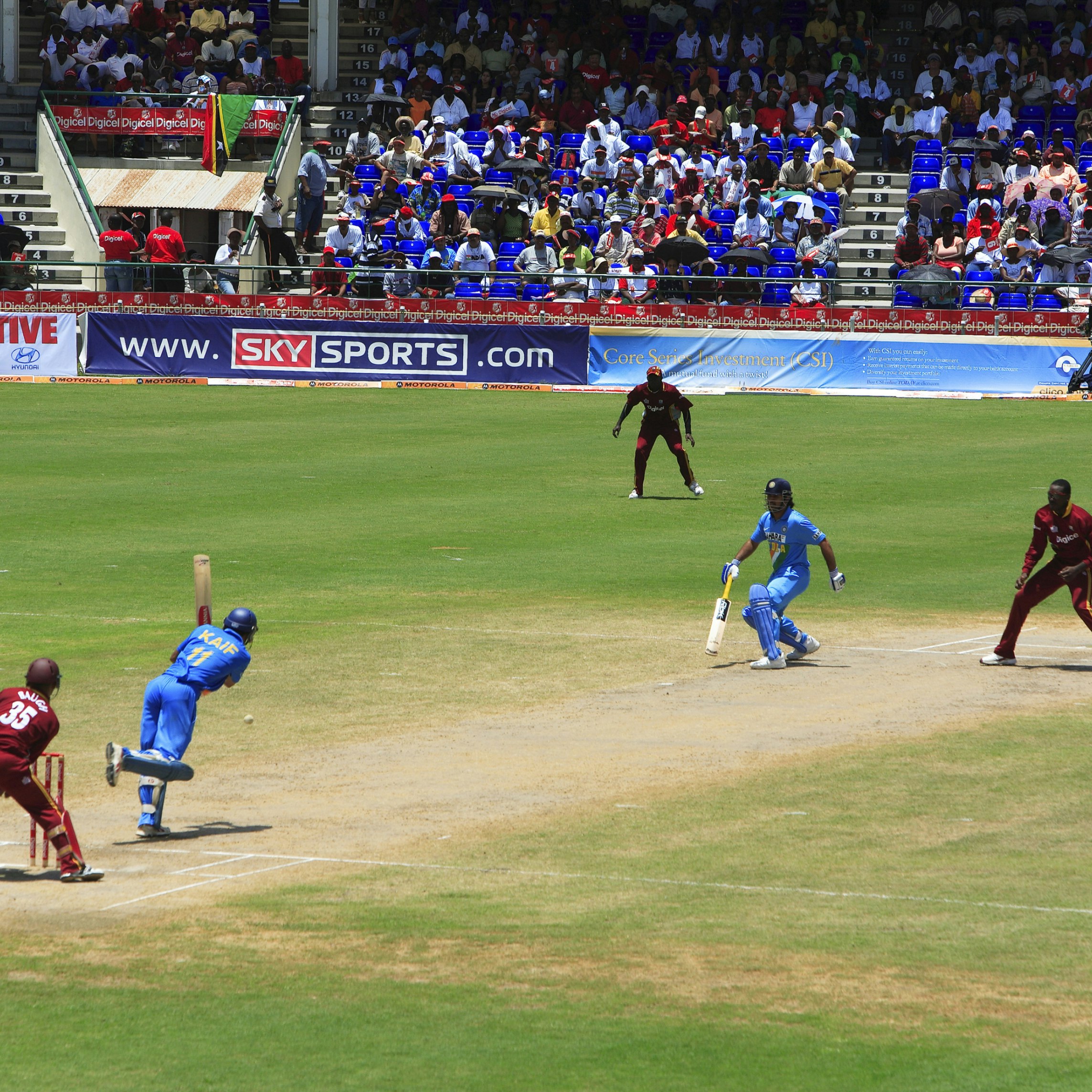 West Indies vs India cricket match at Warner Park Cricket Stadium.