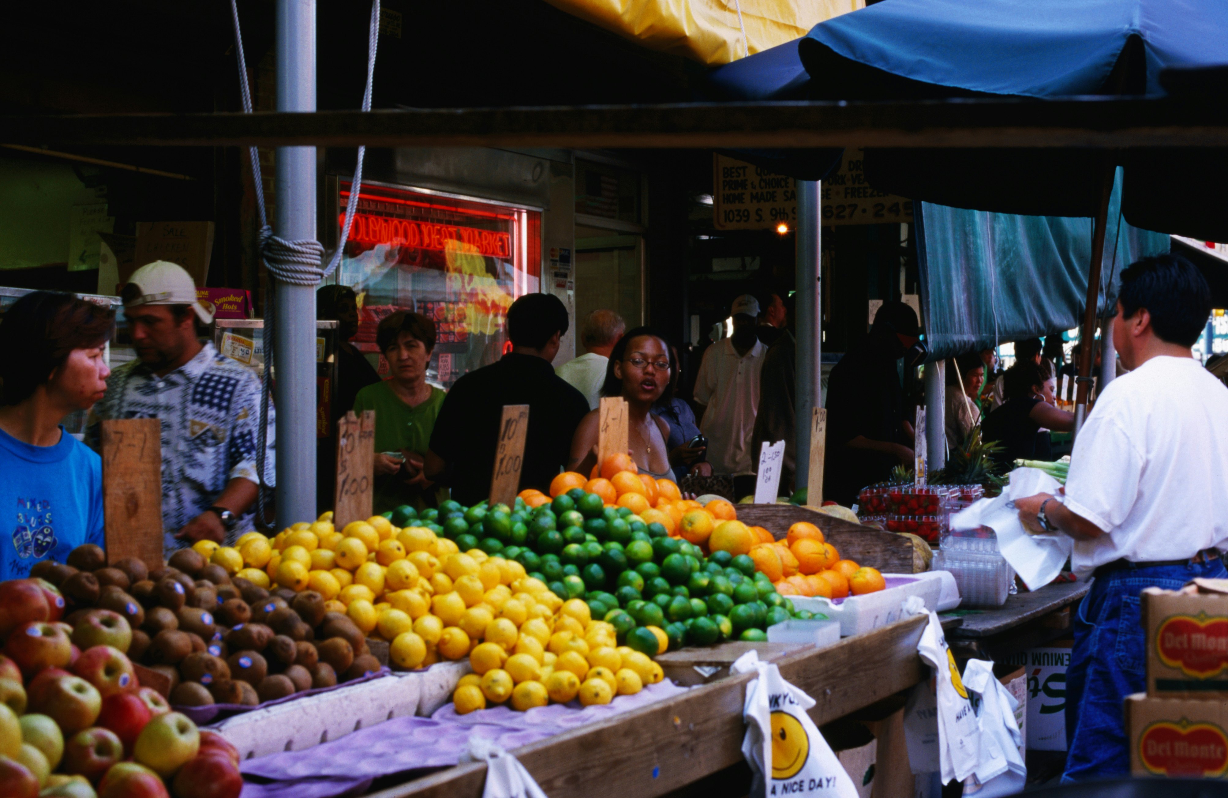 Produce vendor at Italian Market.