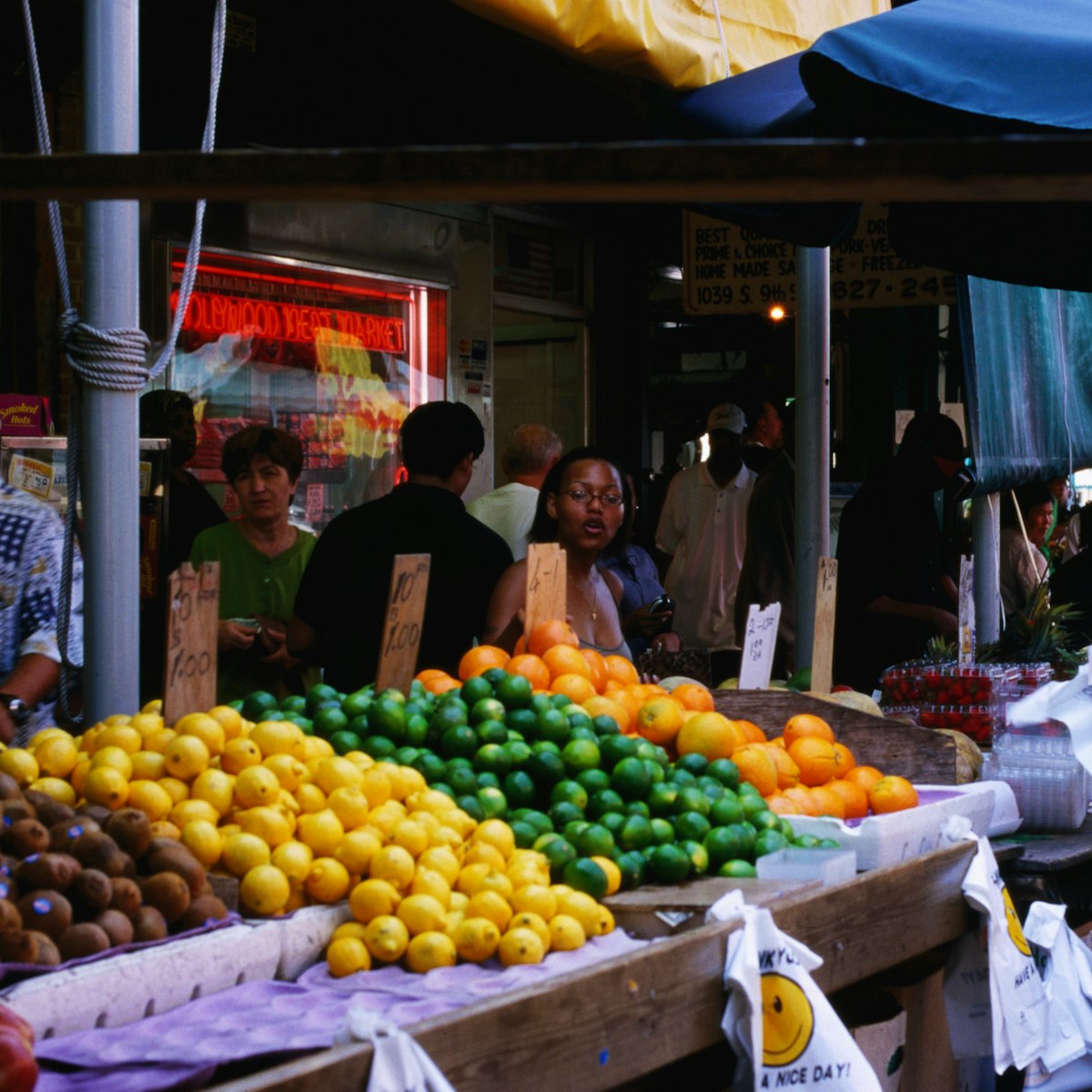 Produce vendor at Italian Market.