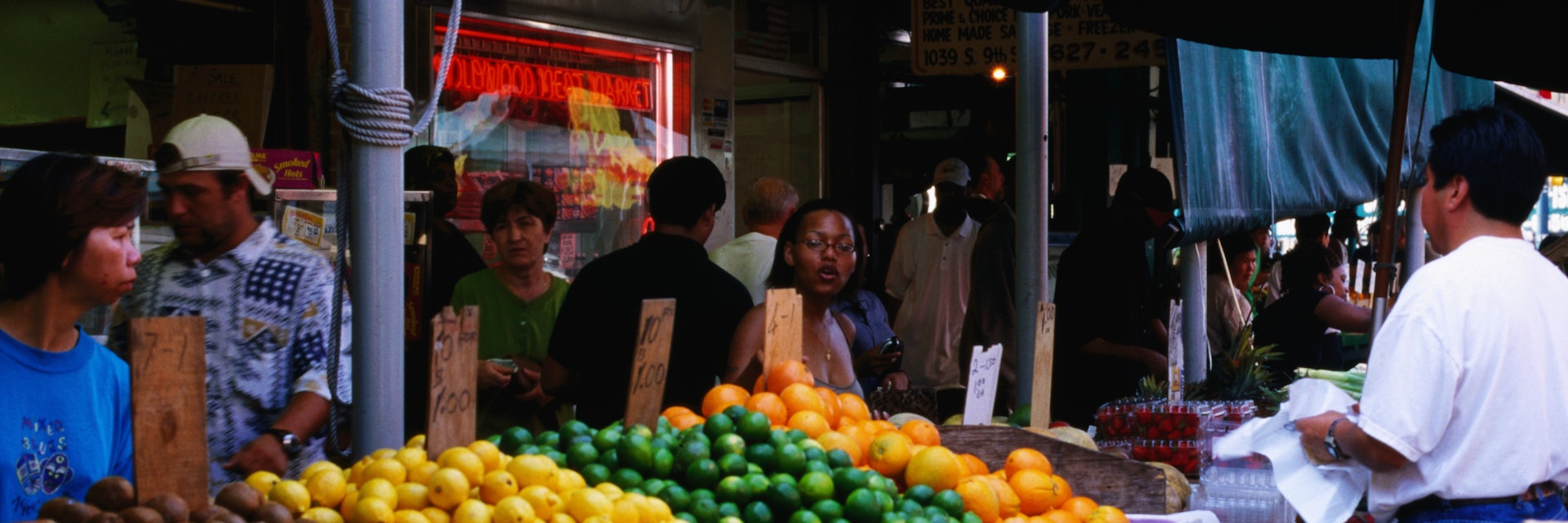 Produce vendor at Italian Market.