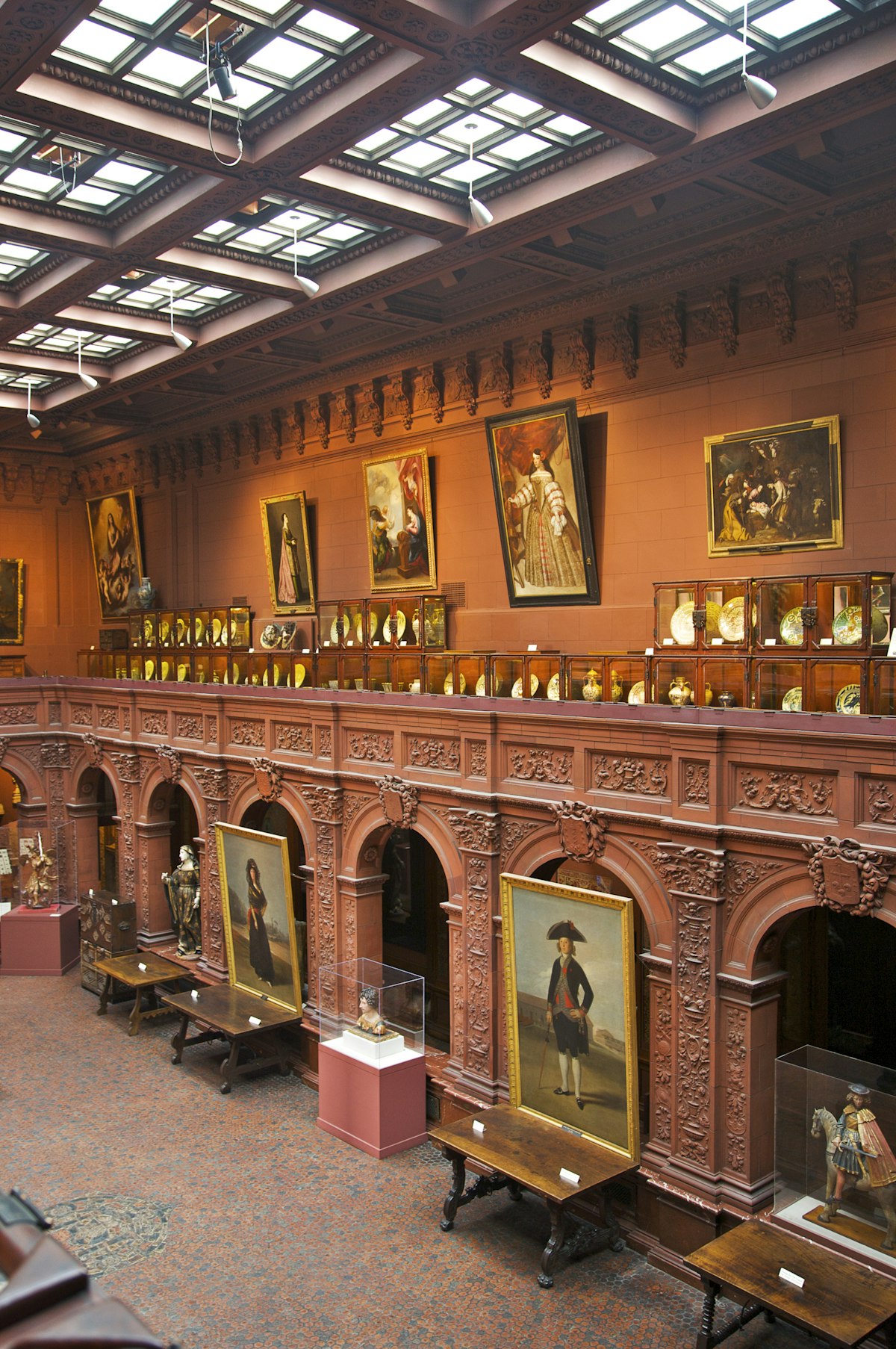 Interior view of Hispanic Society of America showing twostory gallery with paintings, sculpture, decorative arts, archaeology, prints and photographs, Upper West Side, New York, NY, U.S.A.