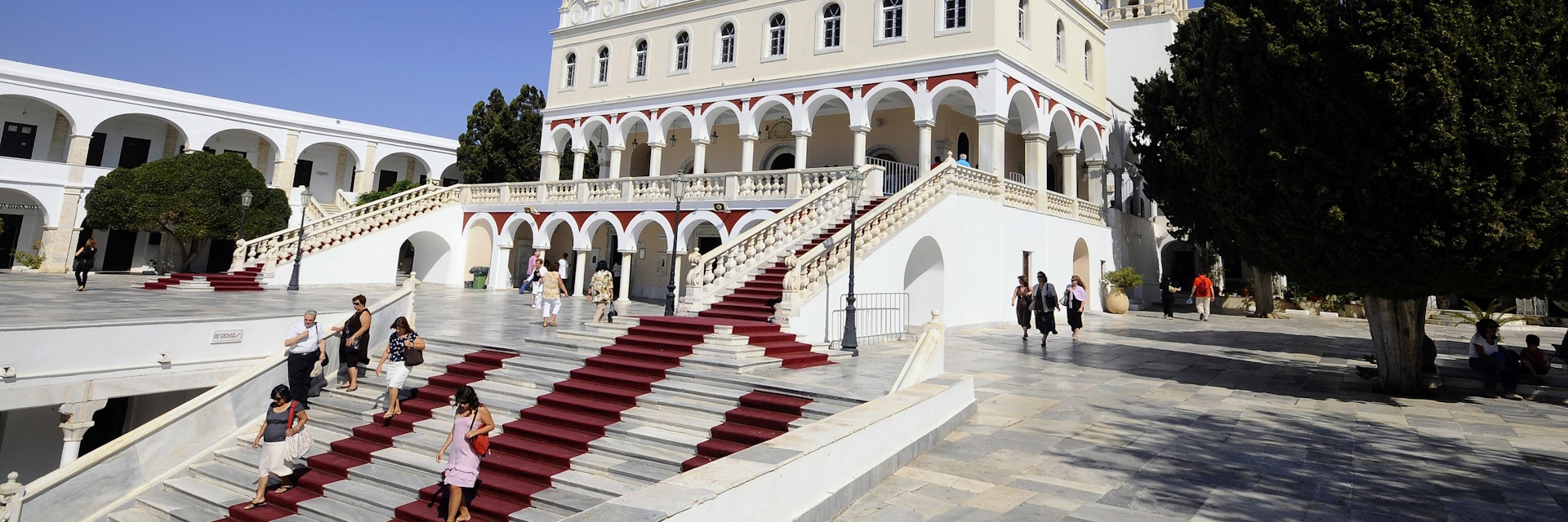 People on the stairs in front of pilgrimage basilica Panagia Evangelistria, Tinos-town, island of Tinos, the Cyclades, Greece, Europe