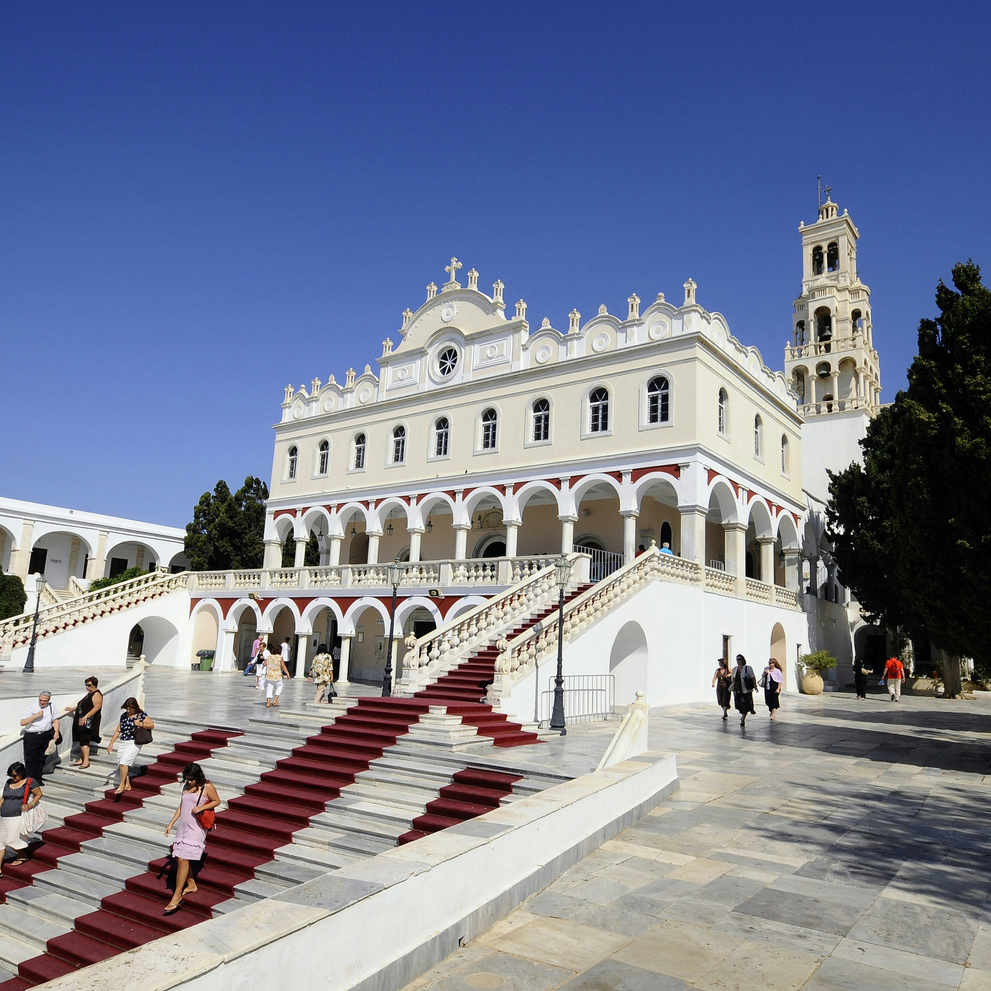People on the stairs in front of pilgrimage basilica Panagia Evangelistria, Tinos-town, island of Tinos, the Cyclades, Greece, Europe