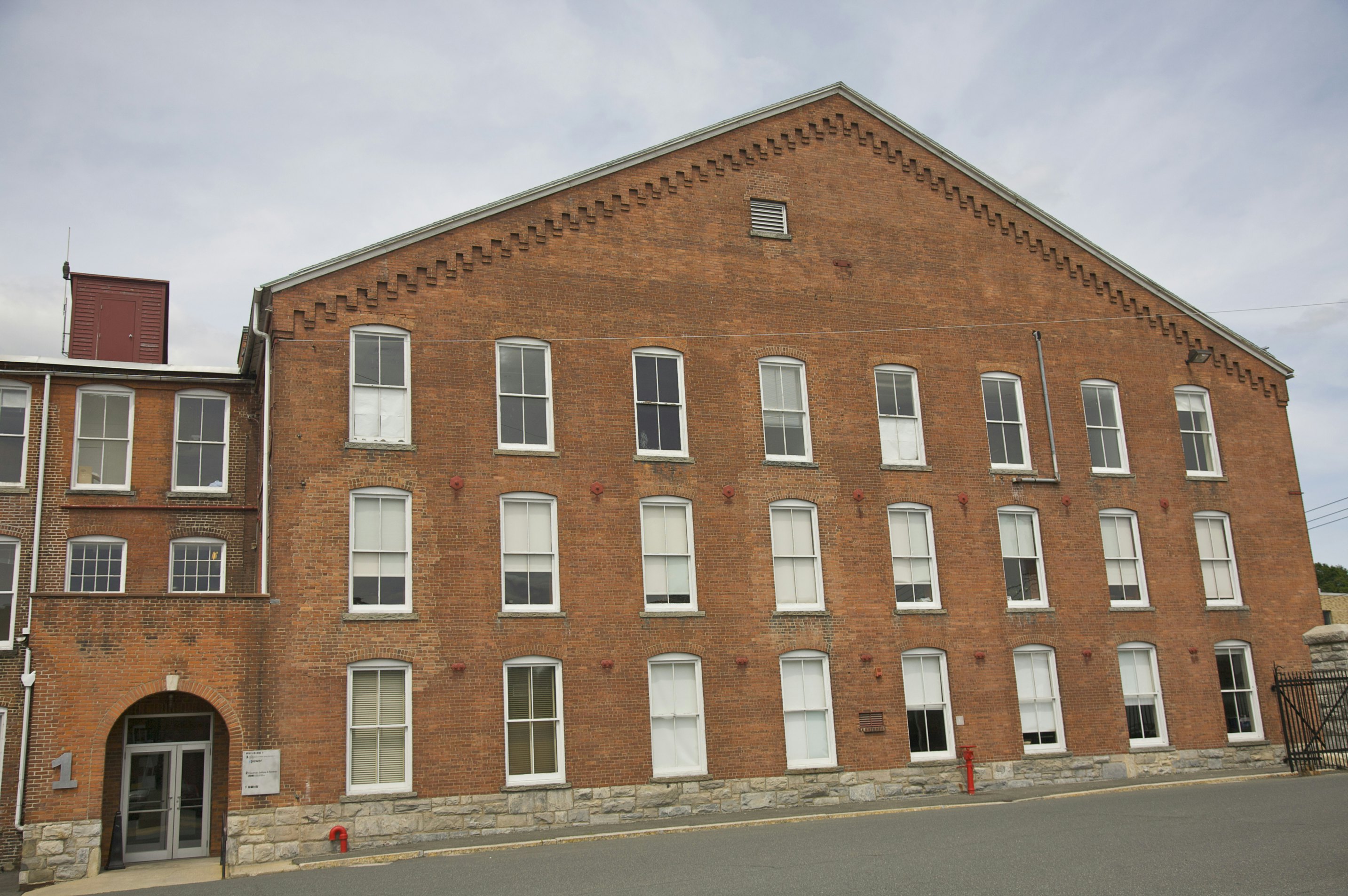 Facade of renovated warehouse building, MASS MoCA, Massachusetts Museum of Contemporary Art, North Adams, The Berkshires, Massachusetts